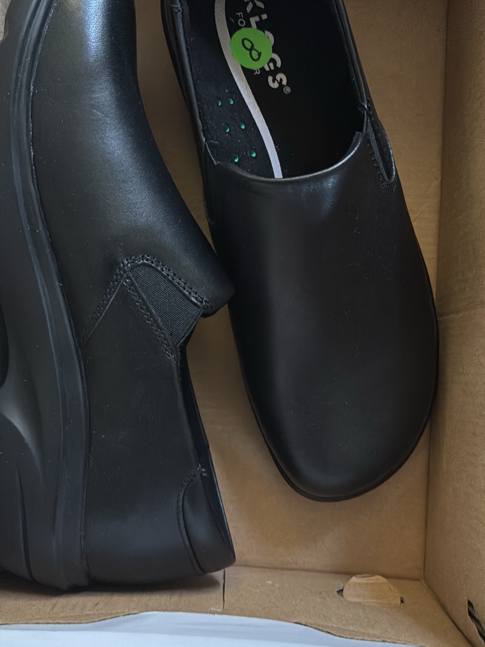 Skechers Black Slip-On Work Mule with Smooth Upper